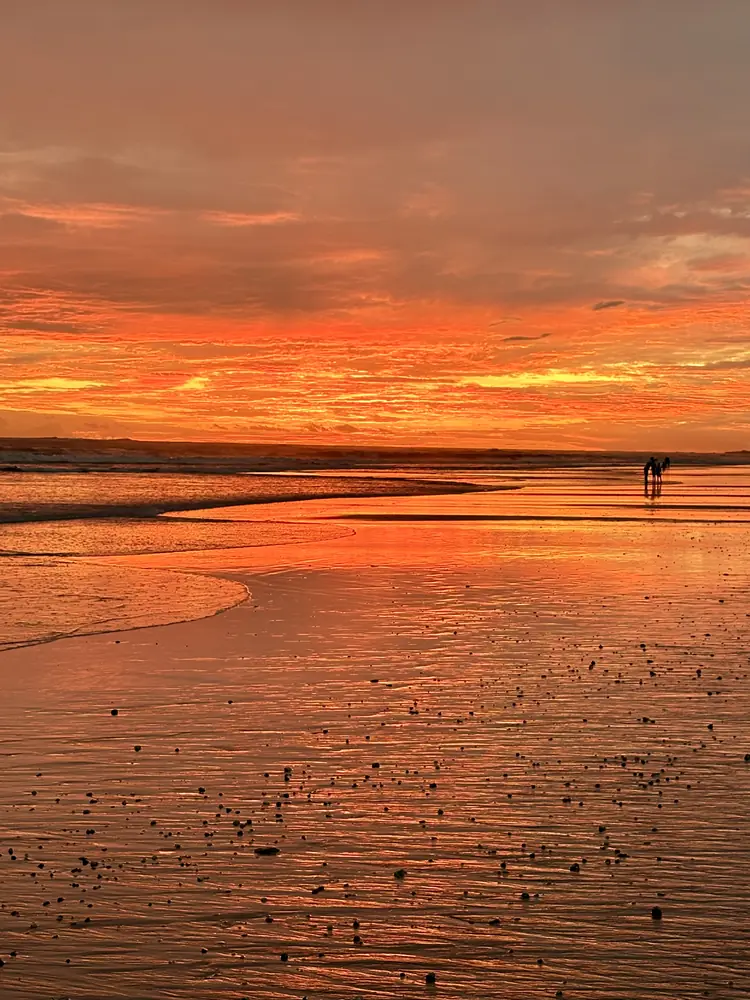 Orange afterglow along the shore